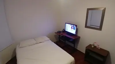Una televisión o centro de entretenimiento en Residencia El Navegante 1