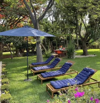 Jardín al aire libre en Casa María de mi Corazón