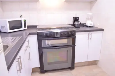Una cocina o zona de cocina en Casa Blue El place ideal for tu descanso