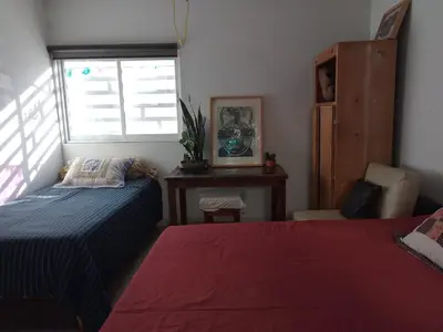 Cama o camas de una habitación en La Noria Barrio