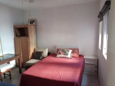 Cama o camas de una habitación en La Noria Barrio