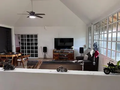 Una televisión o centro de entretenimiento en Casa Vittorinos