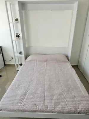 Cama o camas de una habitación en Habitación con baño privado en departamento compartido cerca de zona de conciertos