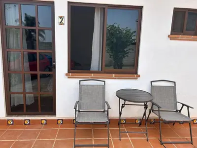 Un balcón o terraza de casa regina