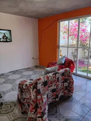 Zona de estar de Tranquila casa