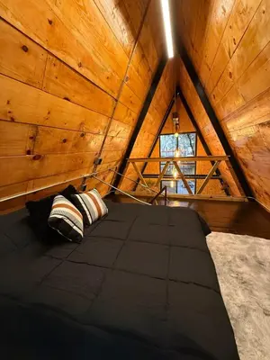 Cama o camas de una habitación en CASATORNI cabaña