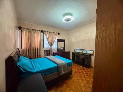 Cama o camas de una habitación en Habitacion Melon