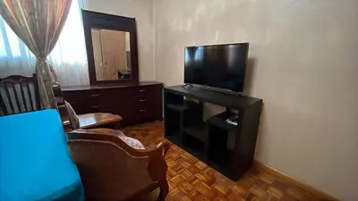 Una televisión o centro de entretenimiento en Habitacion Melon