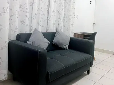 Zona de estar de Habitacion Acojedora