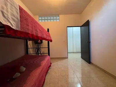 Cama o camas de una habitación en Bonita Quinta Familiar