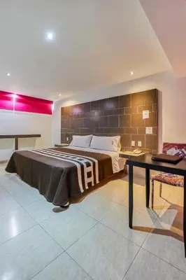 Zona de estar de First Inn Hotel & Business