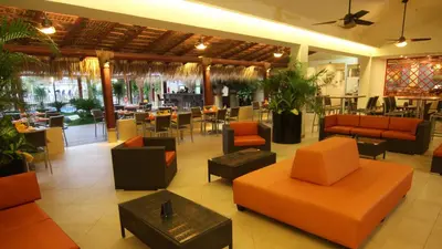Zona de estar de Holiday Inn Huatulco by IHG