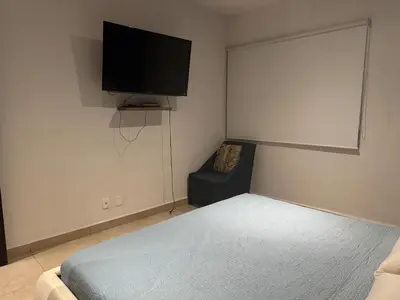 Una televisión o centro de entretenimiento en Casa Mar y Laguna PUERTA AL SOL