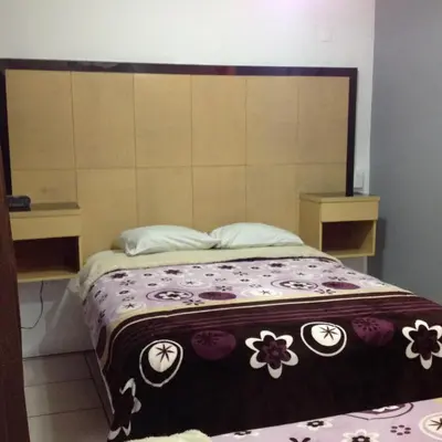 Cama o camas de una habitación en Hotel Galeria & Boutique