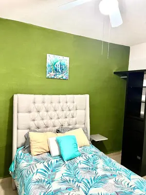 Cama o camas de una habitación en Departamento Zona Diamante