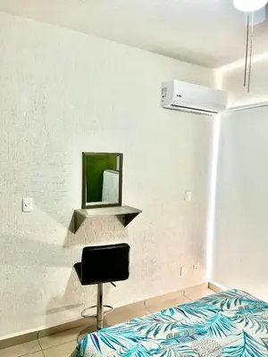Cama o camas de una habitación en Departamento Zona Diamante