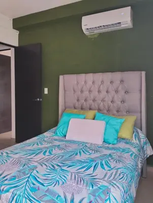 Cama o camas de una habitación en Departamento Zona Diamante
