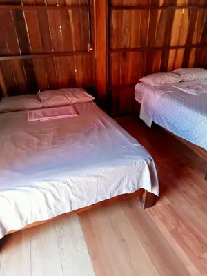 Cama o camas de una habitación en Cabaña la ira
