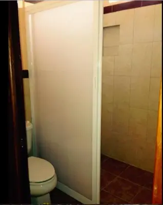 Un baño de Sicarú Suites