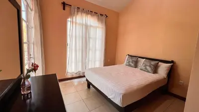 Cama o camas de una habitación en Sicarú Suites