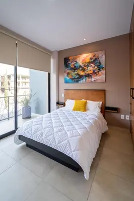 Cama o camas de una habitación en Terrah Suites Oaxaca