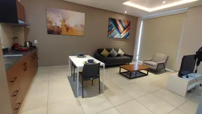 Zona de estar de Terrah Suites Oaxaca
