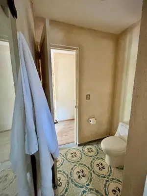 Zona de estar de Val'quirico Auguri Zócalo II, Depto 5 Camas