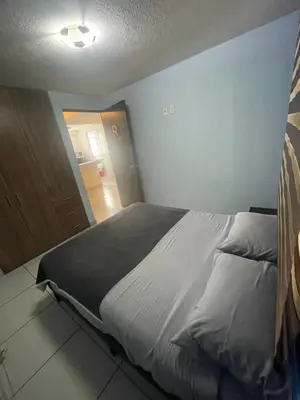 Cama o camas de una habitación en Depa a pasos del Autódromo