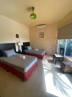 Cama o camas de una habitación en Quinta Duné Boutique - Un Paraíso Frente Al Mar