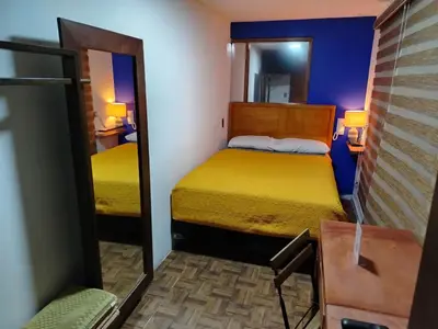 Cama o camas de una habitación en Posada Familiar Lupita