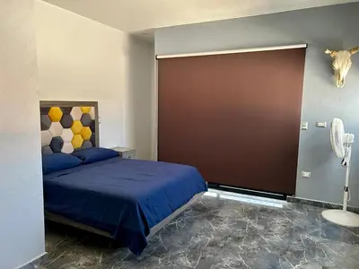Cama o camas de una habitación en La casa de los abuelos