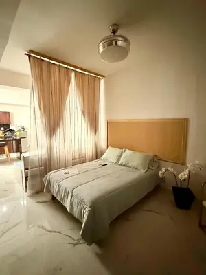 Cama o camas de una habitación en Olum Beach Loft