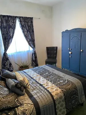 Cama o camas de una habitación en Casa cerca del centro histórico María Luisa