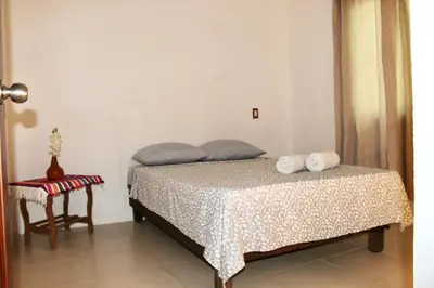 Cama o camas de una habitación en Casas Las Brisas