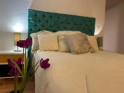 Cama o camas de una habitación en Majestuoso alojamiento