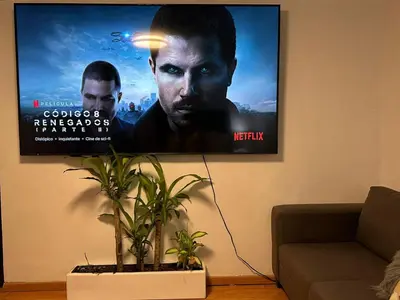 Una televisión o centro de entretenimiento en Majestuoso alojamiento