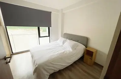 Cama o camas de una habitación en Moderno Loft Totalmente Equipado