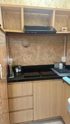 Una cocina o zona de cocina en Habitacion Amarilla