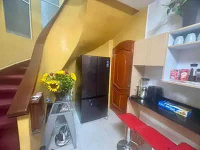 Una cocina o zona de cocina en Habitacion Amarilla