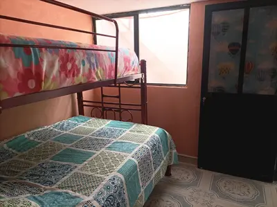 Cama o camas de una habitación en La Casa de los Abuelos