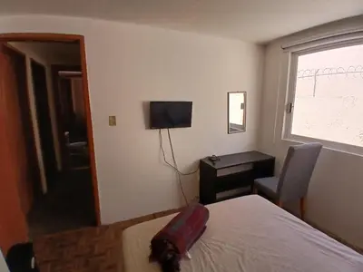 Una televisión o centro de entretenimiento en Residencia El navegante 2