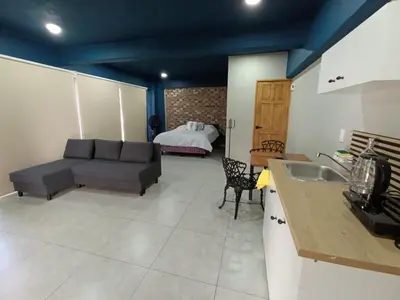 Zona de estar de El Árbol Plaza - Suites Aire