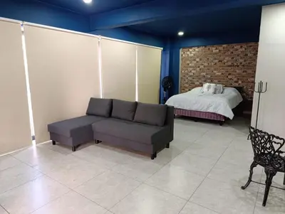 Zona de estar de El Árbol Plaza - Suites Aire