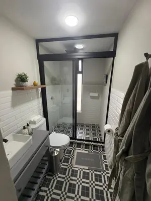 Un baño de Loft ËNXË Boutique Habitación Gray
