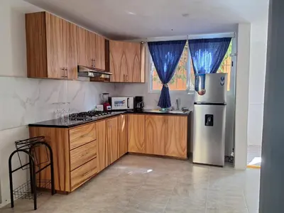 Una cocina o zona de cocina en Departamento Chahué