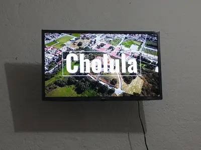 Una televisión o centro de entretenimiento en Amplia casa ideal para grupos grandes en cholula
