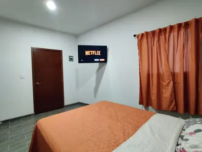 Cama o camas de una habitación en R1- Casa 4