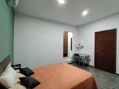 Cama o camas de una habitación en R1- Casa 4