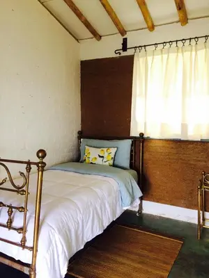 Cama o camas de una habitación en Casa de Barro en un Lugar Mágico Citlalapa