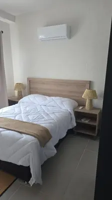 Cama o camas de una habitación en Departamento en Acapulco de Juárez, Club de Playa